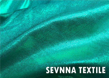 La stampa della stagnola ha riciclato i colori luminosi al neon di progettazione dell'ologramma del tessuto dello Swimwear