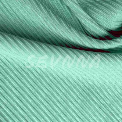 Tessuto di poliestere spandex: il tessuto perfetto per uno stile di vita attivo e alla moda
