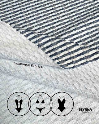 Tissu di costumi da bagno riciclati per le scelte di costumi da bagno ecologici