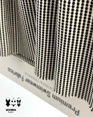 82% Nylon riciclato 5% Lurex 13% Spandex Tessili texturati alternativi con elevata resistenza al cloro