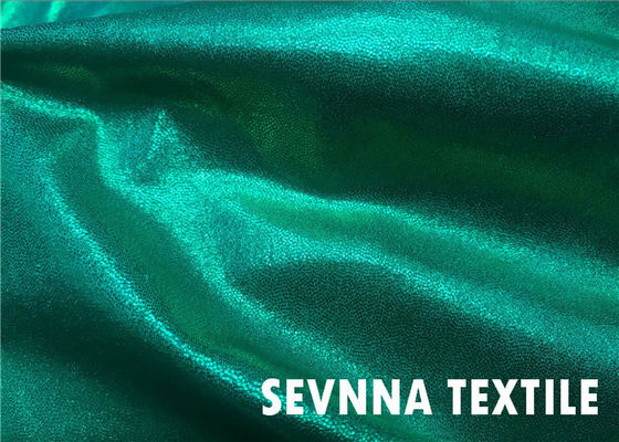 La stampa della stagnola ha riciclato i colori luminosi al neon di progettazione dell'ologramma del tessuto dello Swimwear