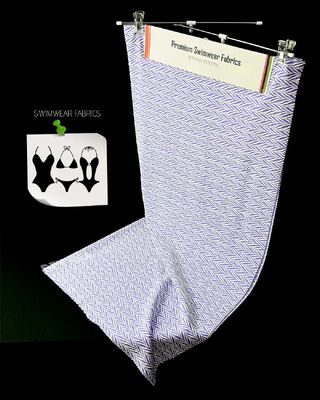 Indumenti da bagno da uomo riciclati tessuto con 58% poliestere riciclato 33% nylon 9% spandex per linee di costumi da bagno sostenibili